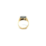 Gold hoop earring with green stone