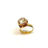 Red gold ring with white stone