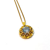 Pendant flower with round blue stone
